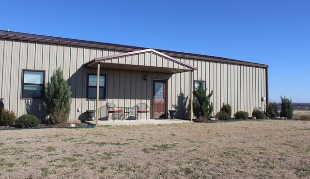 Country hilltop retreat on 10 acres with a pool and hot tub