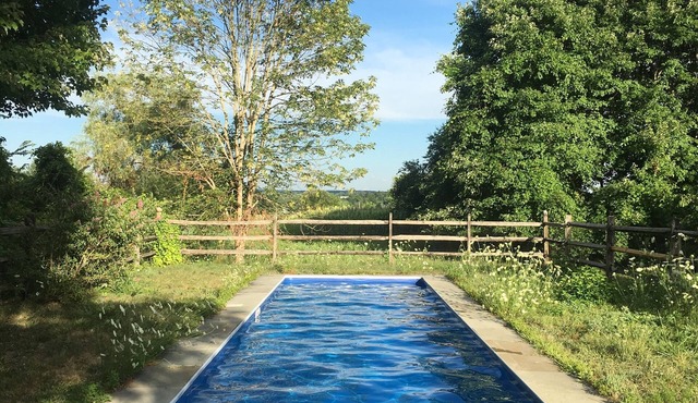 Country home in a park-like setting, perfect for private enjoyment.