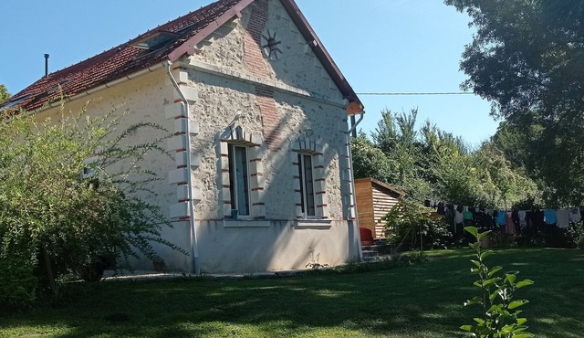 Country house by a stream