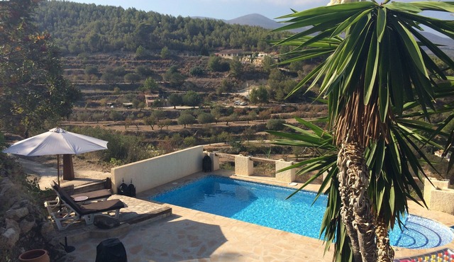 Country house, "Las Ruinas" with pool between almond trees and olive groves.
