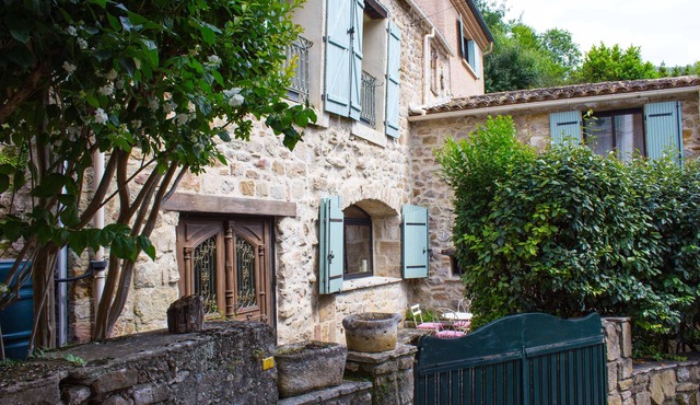 Country house set in a rural location with terraced gardens and stunning pool