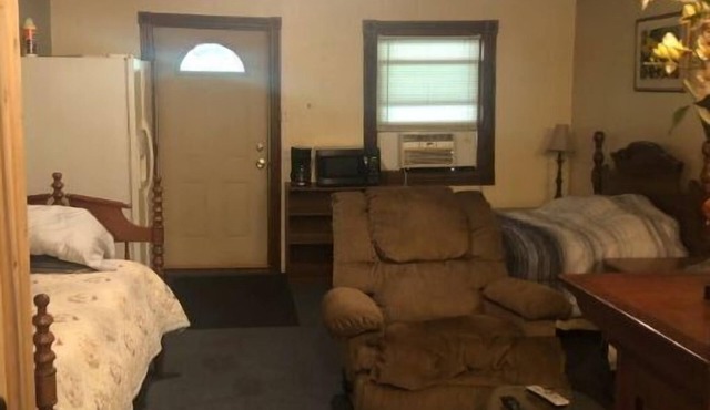 Country Inn with 90 ft porch like oversized motel room with full kitchen , wifi