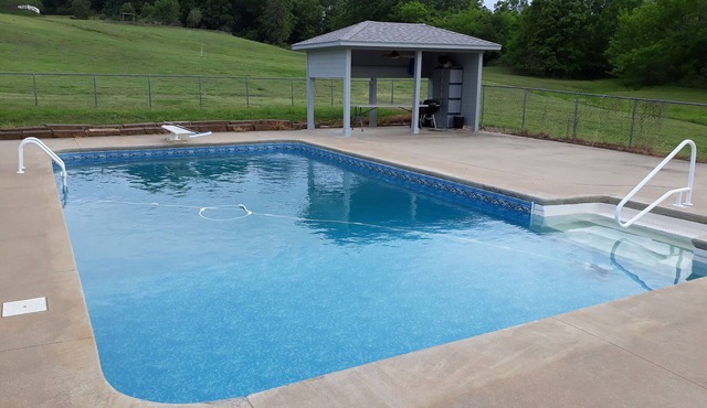 Country lake retreat with Pool and Boat Dock!nCozy + food/attractions nearby!