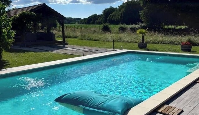 Country views, luxury heated in-ground swimming pool, large & family friendly.