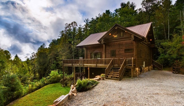 Couple's private escape mountain cabin with fireplace and hot tub on deck