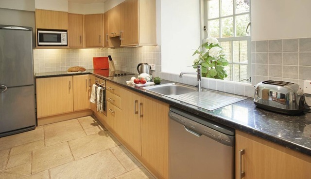 Courtyard House is a restored wing of a large Victorian Farmhouse and sleeps six within a rural loca