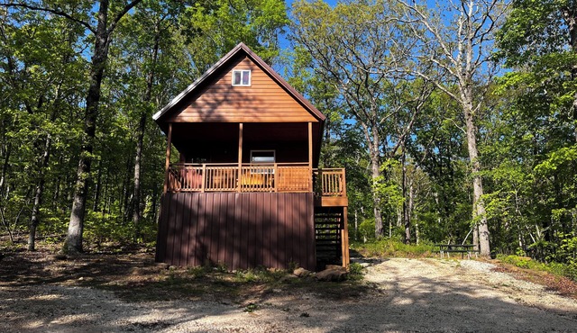 Cowboy Cabin is a quiet place to camp in the woods with the amenities of home.