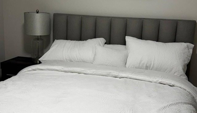 Cozy 1-bedroom apartmentnClose to the YQM airport nprivate entrance and style.