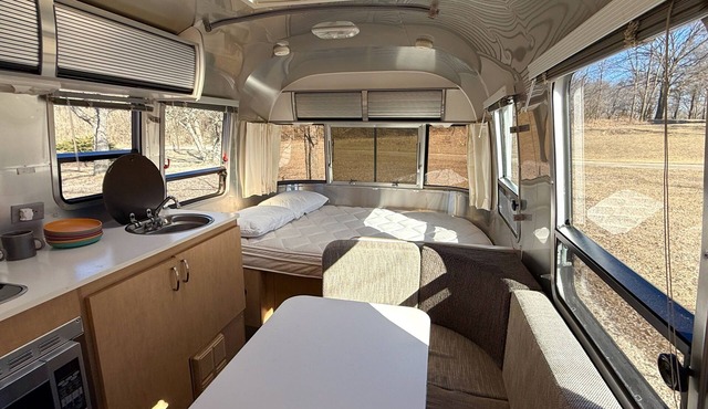 Cozy 1-bedroom Bambi Airstream camper on a 56 acre farm with stream and woods.