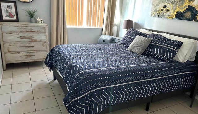 Cozy 1-bedroom condo with private garage, AC, & WiFi