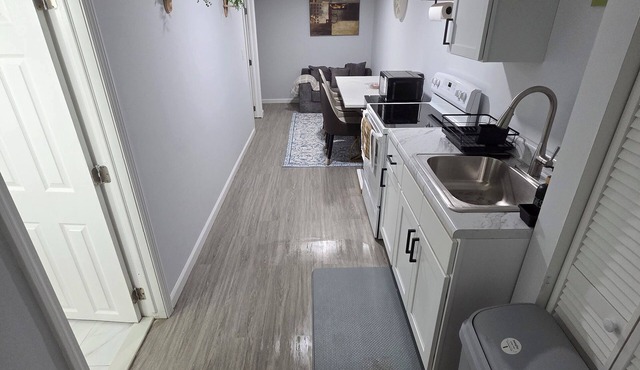 Cozy 1-king size bedroom house in quiet Waterbury with 75" TV in your bedroom.
