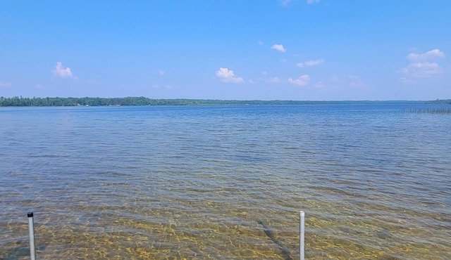 Cozy 1950’s lake front cabin with beautiful sunsets!