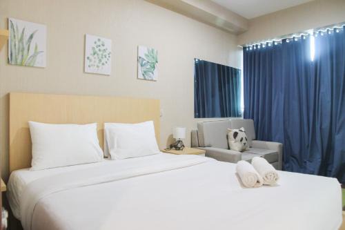 Cozy 1BR Apartment Grand Kamala Lagoon By Travelio