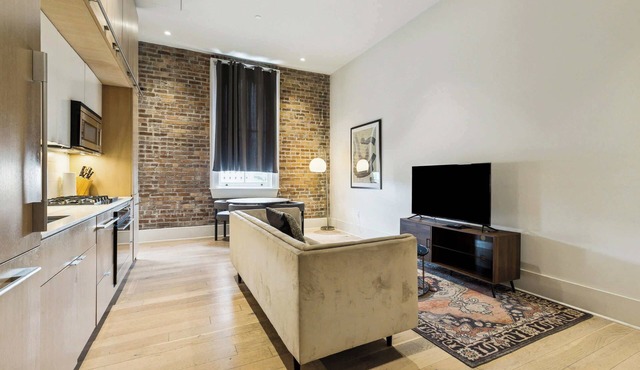 Cozy 1BR Apartment Near CBD | Gated Parking | Gym