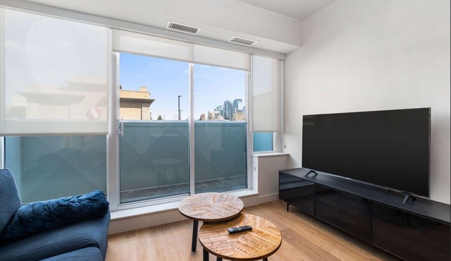 Cozy 1BR Condo, Steps from CTrain Station!