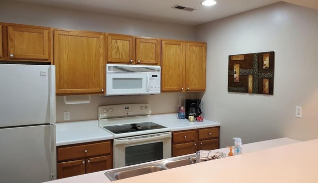 Cozy 2-bedroom condo with few steps, a boat slip, and WiFi in a great location!