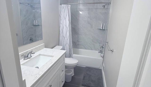 Cozy 2-bedroom condo in charming Northville with AC and gym access