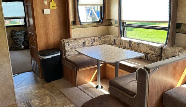 Cozy 2-bedroom RV in charming Apple River with AC