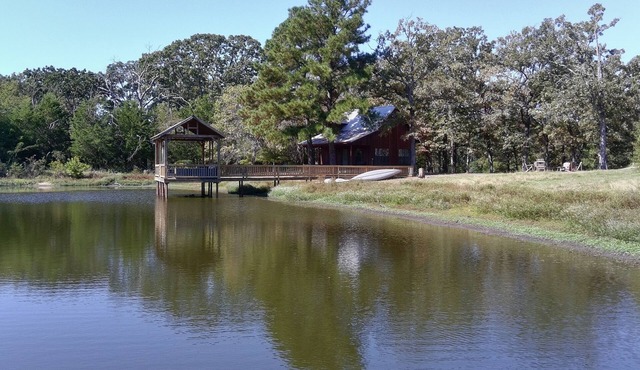 Cozy 2-Story Cabin on Pond with Dock on a Spacious Homestead Retreat