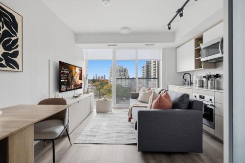 Cozy 2BR Condo with Free Parking & City Views