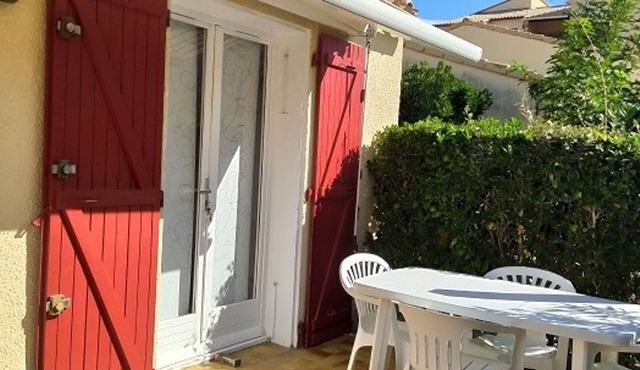 Cozy 2BR + Mezzanine with A/C, Private Parking, and Terrace, 400m from Beach
