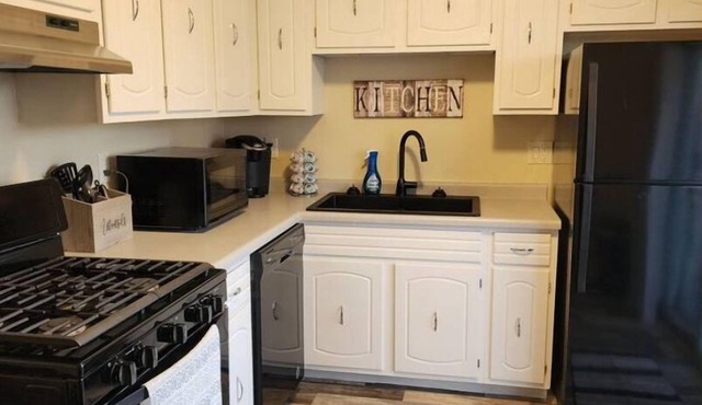 Cozy 3 bedroom 1 bath home close to airport and minutes from highway.