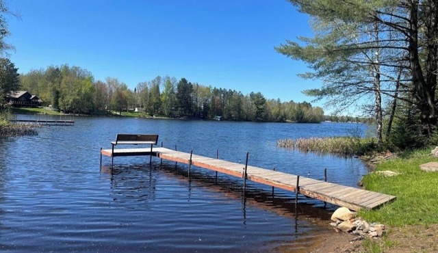 Cozy 3-bedroom cabin in Phillips on Soo Lake w/WiFi, kayaks, fire pit & grill