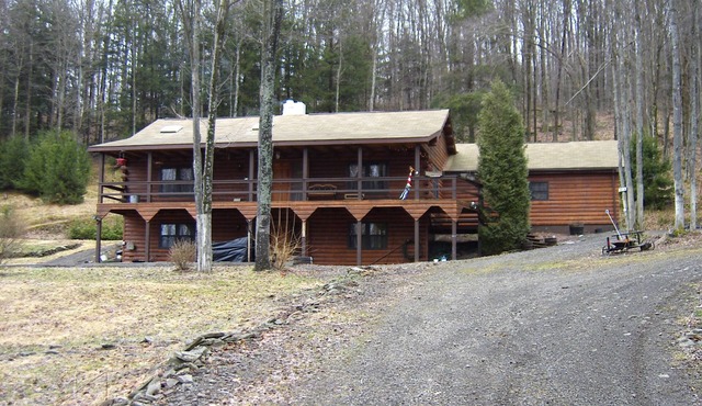 Cozy 3 bedroom log cabin in a scenic country setting. Very private