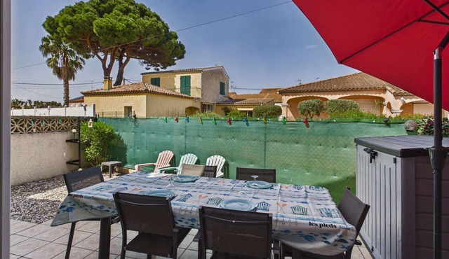 Cozy 3-Bedroom Villa with AC, Terrace & Garage - 450m from Beach