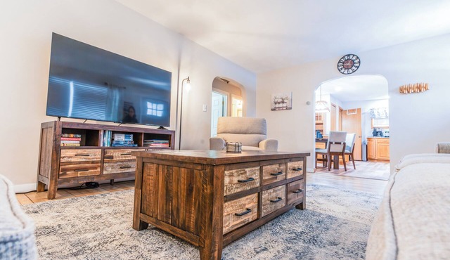 Cozy 3-BR bungalow w/private backyard, playground, basement game room, & views