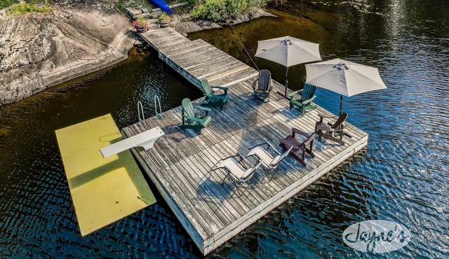 Cozy 4 bed 2 bath cottage on Pine Lake with 1 bed Bunkie! W Exposure! Hot Tub!