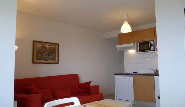 Cozy 4-person apartment with ski-in access, dishwasher, washing machine, ski locker, free parking