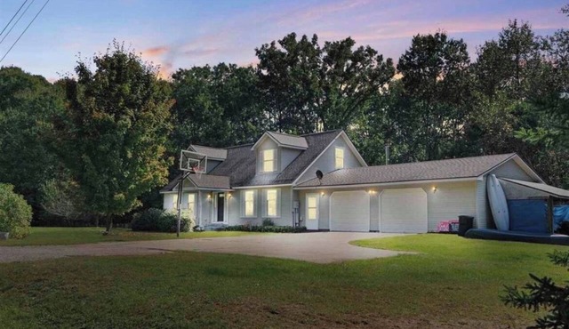 Cozy 4br 3 bath home with acreage and a creek just minutes from Boyne Mountain