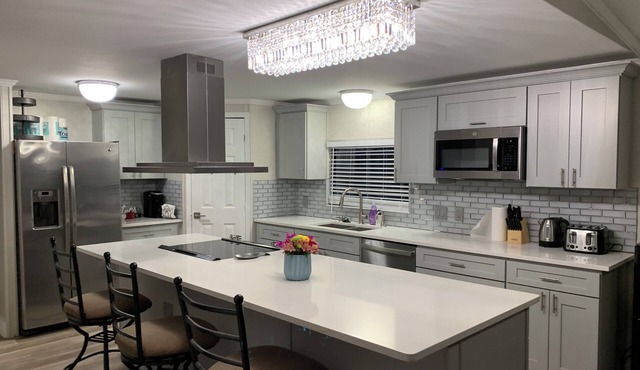 Cozy 5 Bedroom 85” TV Home in a Secluded Area