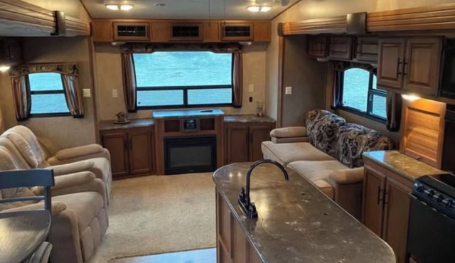 Cozy 5th wheel RV across Mille Lacs lake