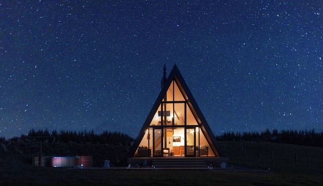 Cozy A Frame Cabin located on a working sheep and beef farm with hot tub