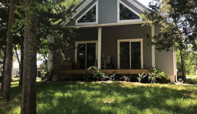 Cozy A-Frame cabin right next to the water.