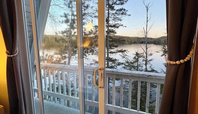 Cozy A-Frame chalet on the beautiful Kennisis Lake. Family and Pet Friendly!