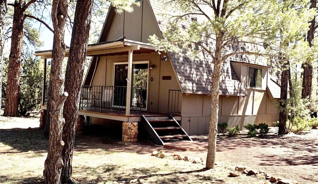 Cozy A Frame on 1 acre beautiful ponderosa and piñon pines, and junipers.