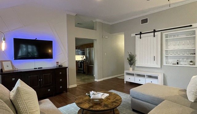 Cozy and cheerful three bedroom home with hot tub.