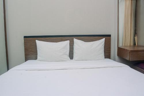 Cozy and Minimalist Kebagusan City 2BR Apartment By Travelio