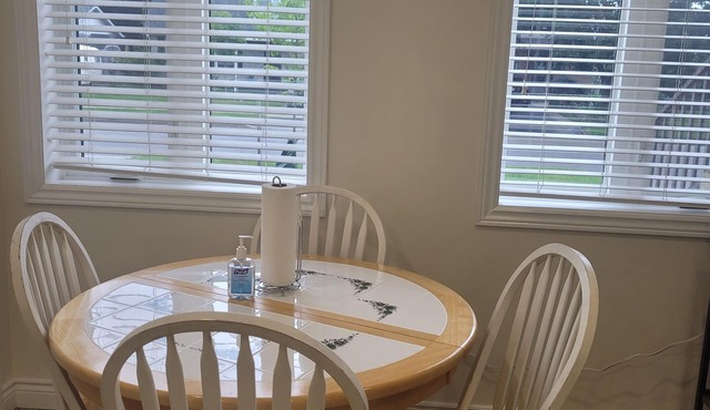 Cozy and modern bachelor suite with kitchenette and bath