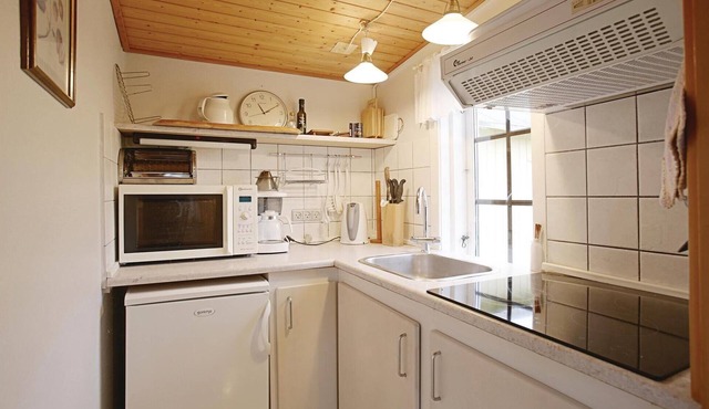 Cozy and nicely furnished older half-timbered house with large bedroom in the outbuilding. The house