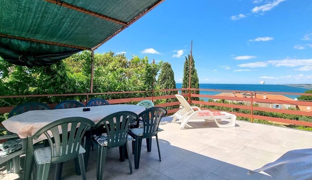 Cozy apartment just 100 meters to the beach with panoramic views, sunbathing area, barbecue