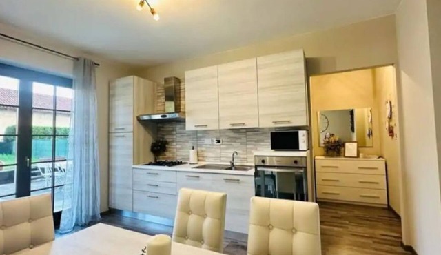 Cozy apartment with mountain view from back deck and fenced in yard.