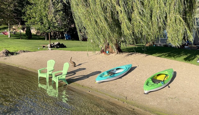 Cozy Beach Getaway with Private Sandy Beach & Dock, 2 Paddle Boards, & 2 Kayaks