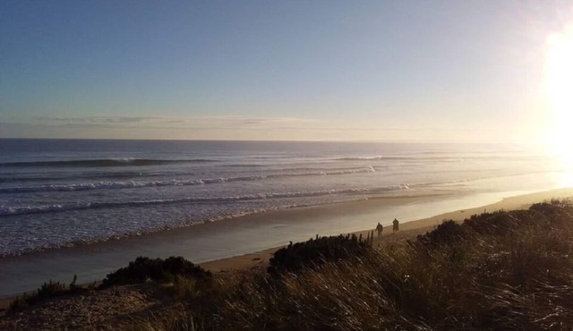 Cozy beach house short walk to shops, beach and playground.