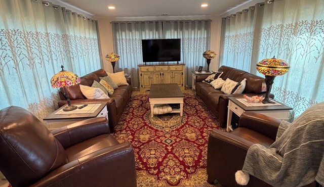 Cozy Beach Retreat with three bedrooms and three queen size beds.