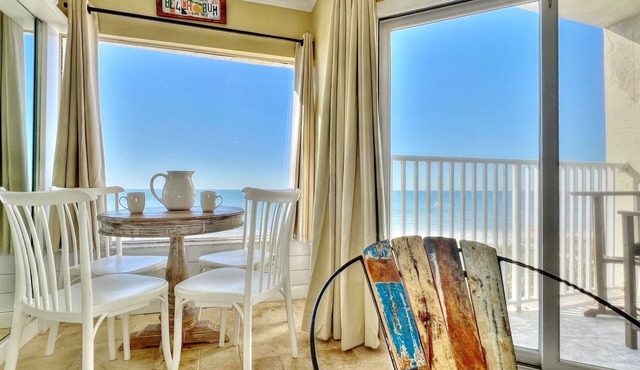 Cozy Beachfront Retreat right on the Sand, Sparkling Pool, & Charming Coastal Flair!