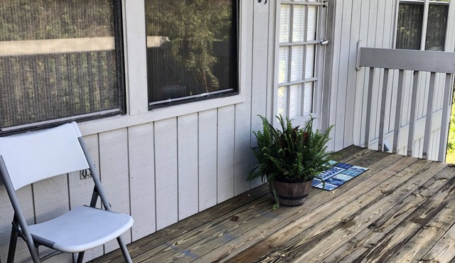 Cozy Beachside town getaway with quiet preserve views.